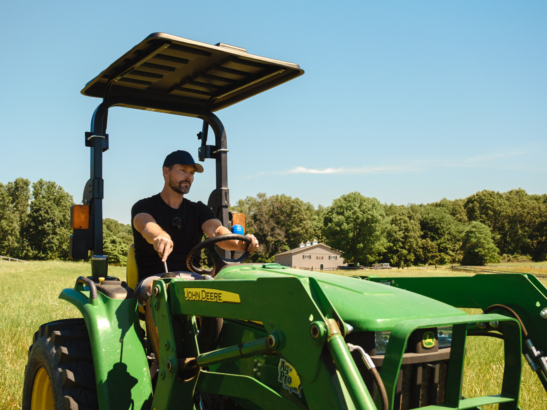 Rhinohide Canopy Mounted Above Roll Bar on John Deere 3025E