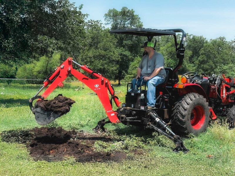 Shade Provided by Rhinohide Canopy Over Tractor Backhoe
