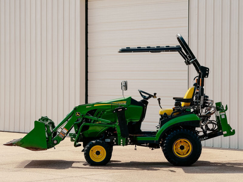 Side View of Rhinohide Canopy on John Deere 1025R with Angled Roll Bar