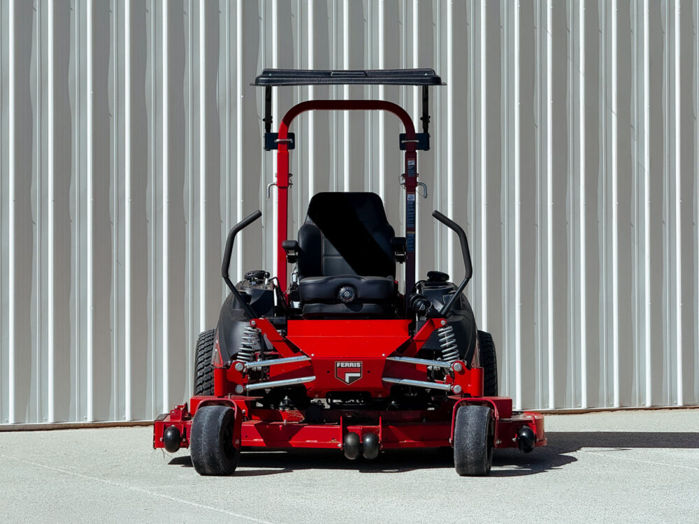 a Ferris zero turn mower with a black canopy mounted to the roll bar