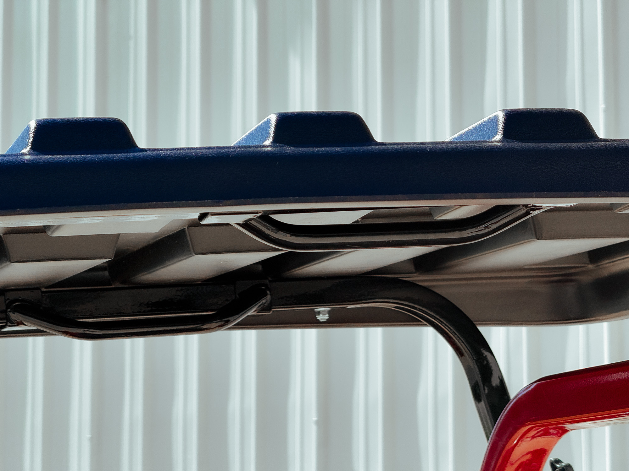 a side view of a canopy with grab handles