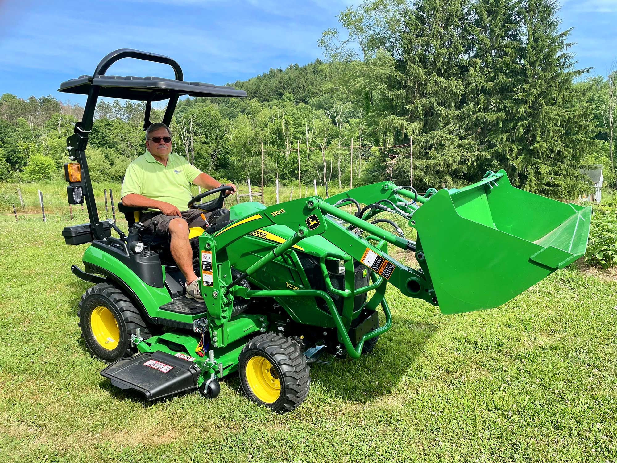 Rhinohide Canopy Notched between Roll Bar on John Deere 1025R